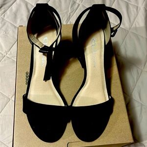 Black suedette ankle strap heeled sandals with tassels